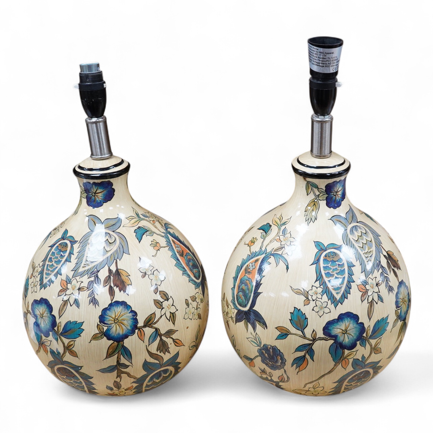 A pair of Persian inspired floral painted pottery table lamps, 33cm high